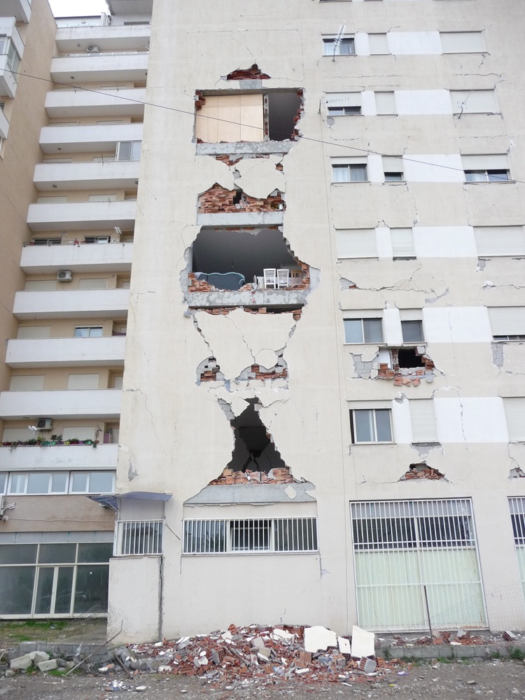 A picture containing building, white, apartment buildingDescription automatically generated